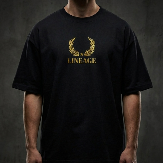 Model wearing black oversized tee with lineage design on front.