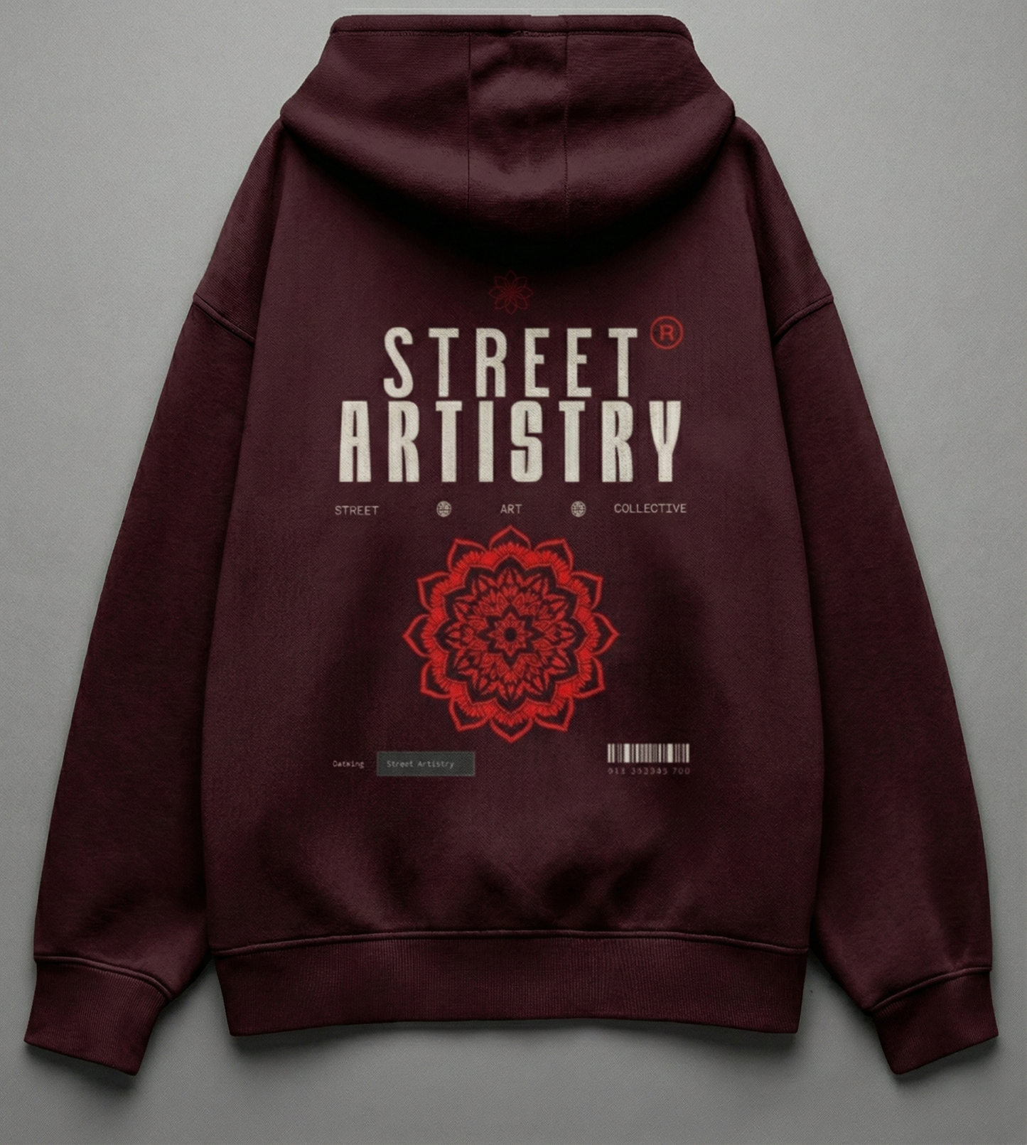 Flat lay of maroon Street Artistry hoodie showing detailed back design.