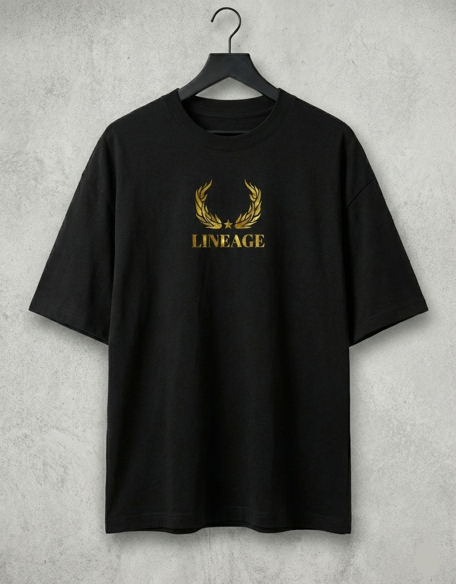 Black oversized tee on hanger with gold Lineage crest on chest.