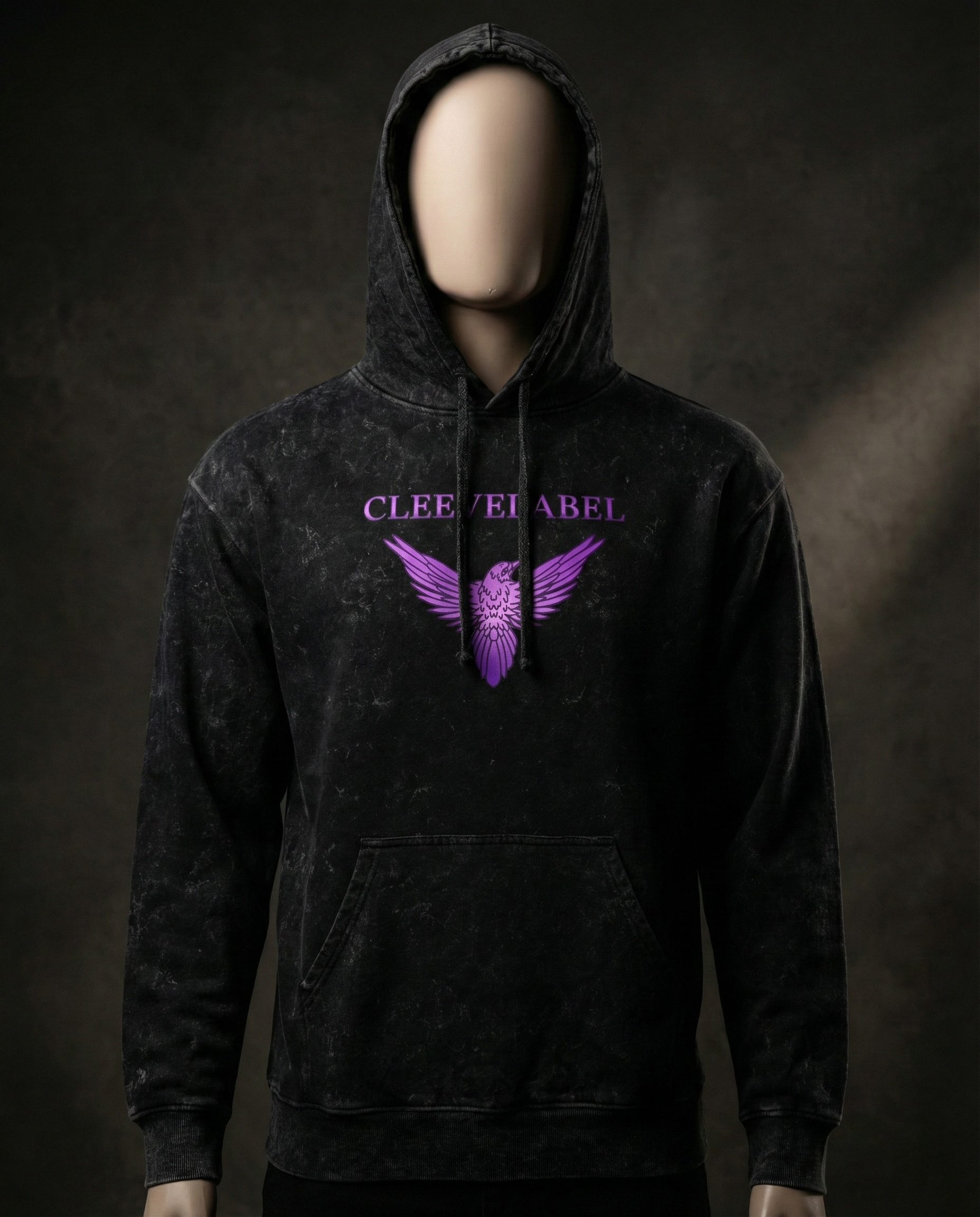 Black acid-wash Salvation hoodie on mannequin with purple angel wings and Cleevelabel logo, front view in dramatic studio lighting.